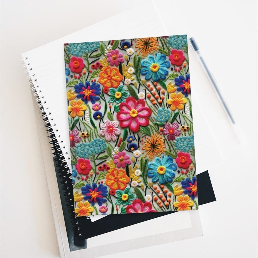 Bright and colorful garden stitchwork printed n the cover of a hardback journal