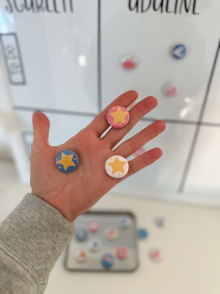 Hand holding magnetic Dots