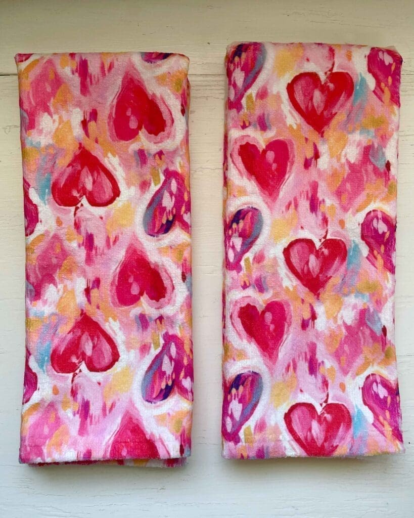 How to Recreate the Viral Dish Towel Bow 2 Two painted hearts valentine's day hand towels by Zappy Dots, pinks and reds