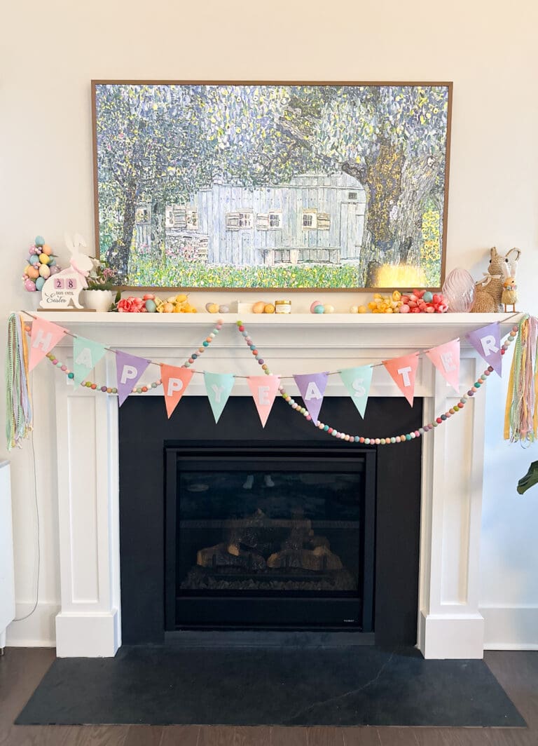 Happy Easter garland hanging over fireplace